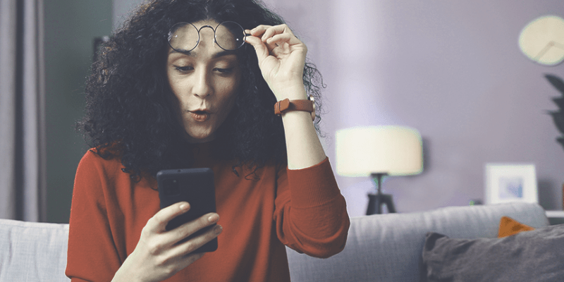 Woman looking at smartphone
